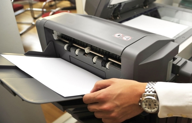 How to change paper in the printer