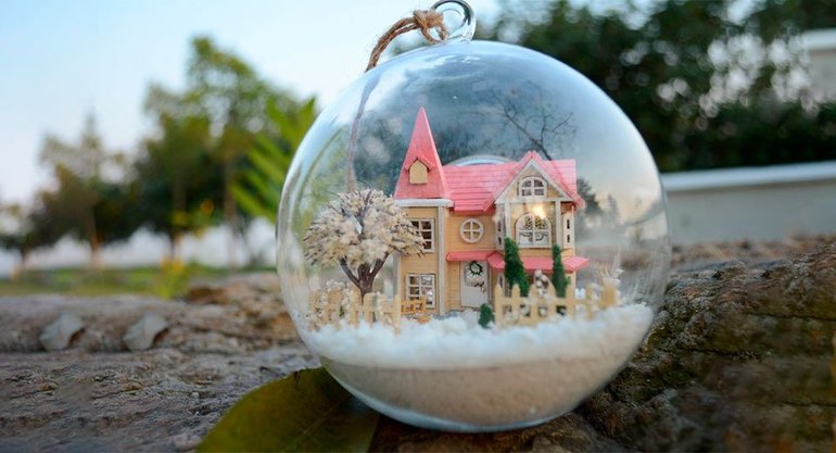 Snow globe with a house inside.